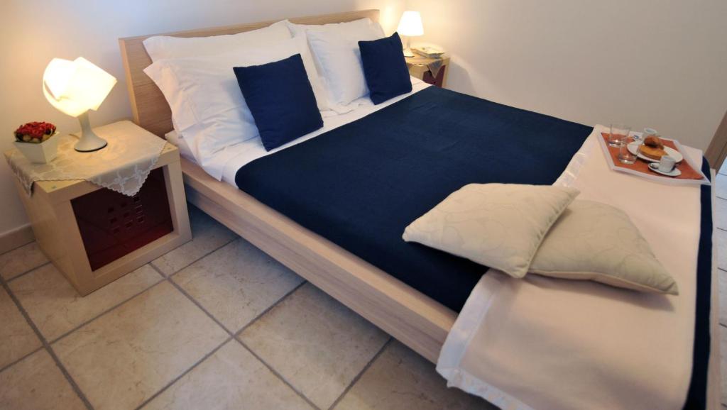 Postel nebo postele na pokoji v ubytování B&B A Casa Di Joy