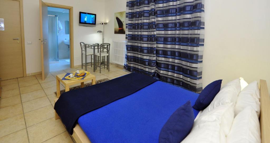 Postel nebo postele na pokoji v ubytování B&B A Casa Di Joy