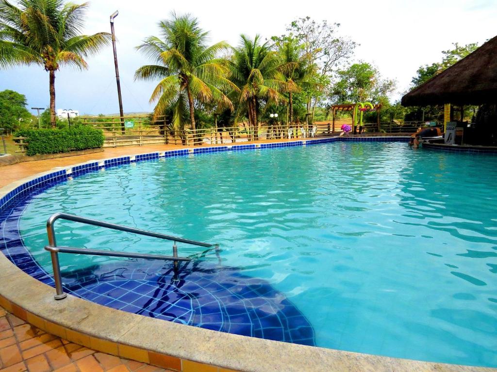 A piscina localizada em Pontal do Lago Apartamentos para Temporada ou nos arredores