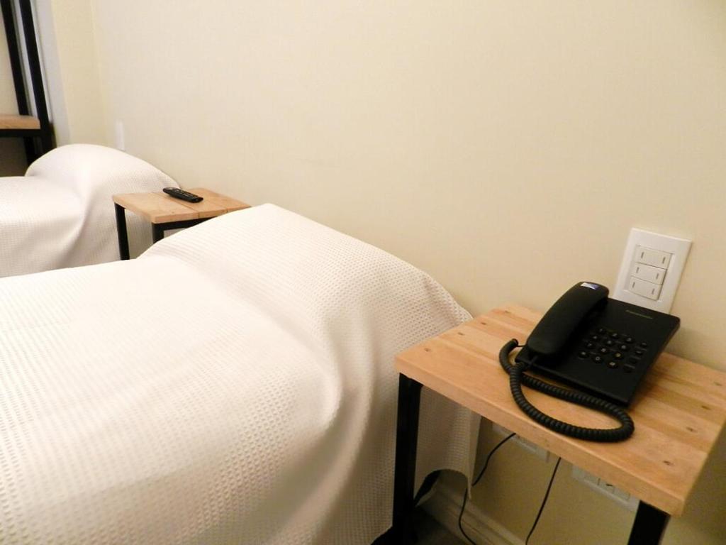 Cama ou camas em um quarto em Hotel Monaco