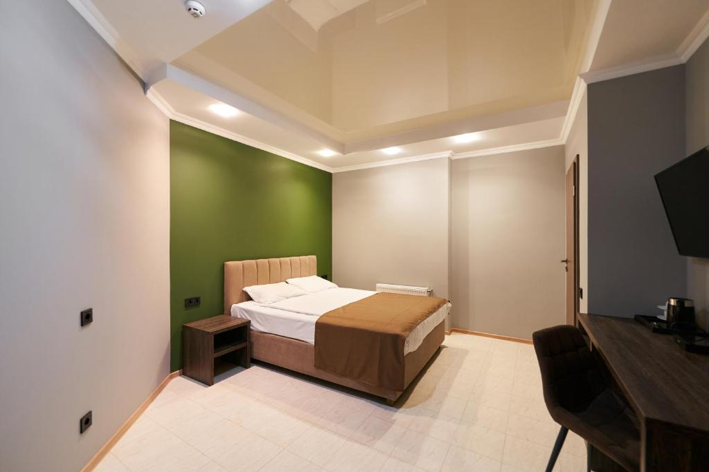 Postel nebo postele na pokoji v ubytování Hotel Classic