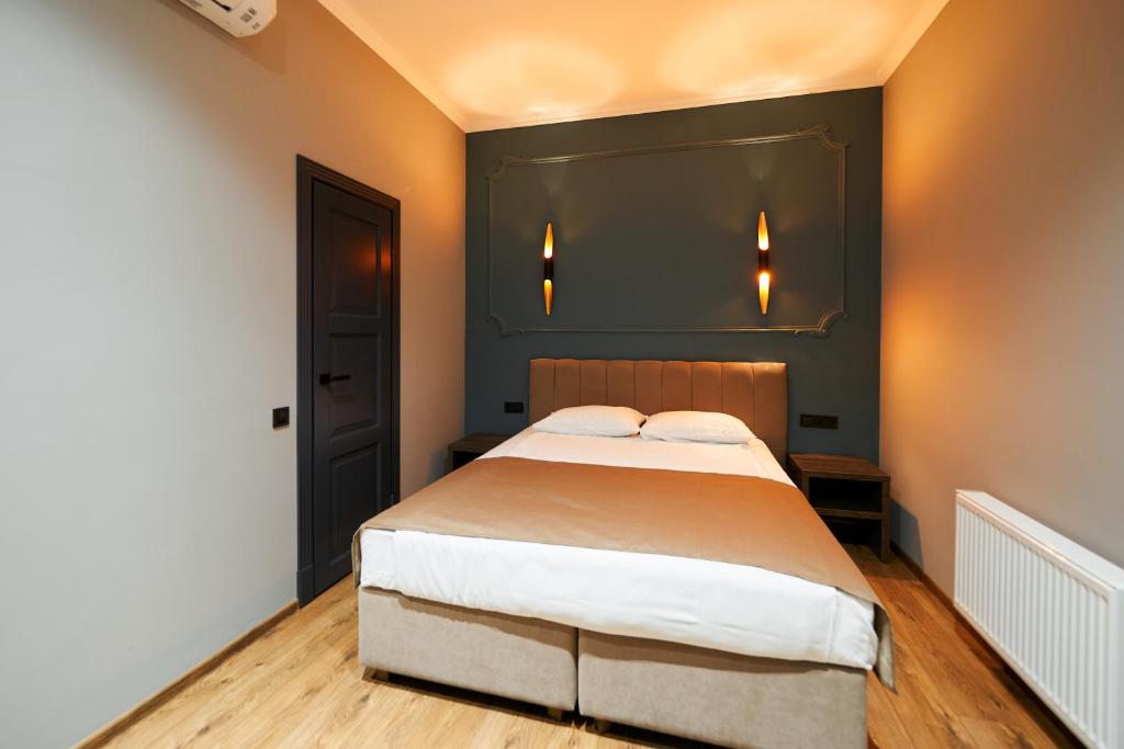Postel nebo postele na pokoji v ubytování Hotel Classic