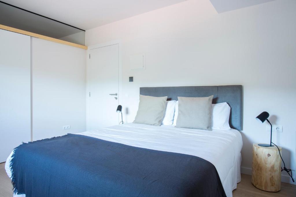 Postel nebo postele na pokoji v ubytování Hotel Rural Mas de l'Illa