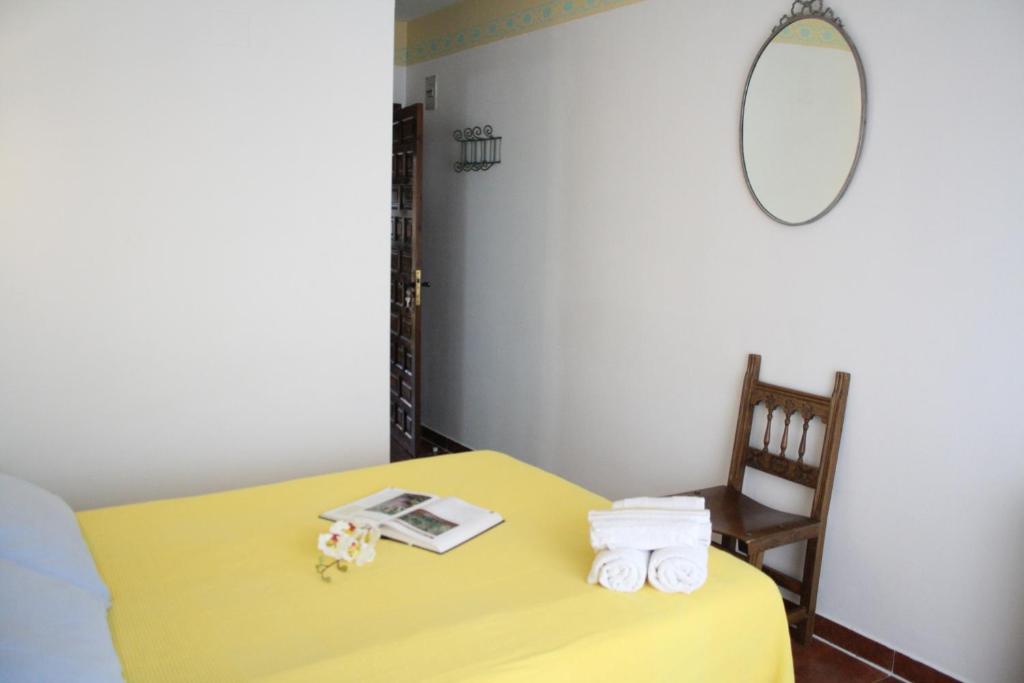 Postel nebo postele na pokoji v ubytování Alojamiento y habitacionesla cañada monfrague