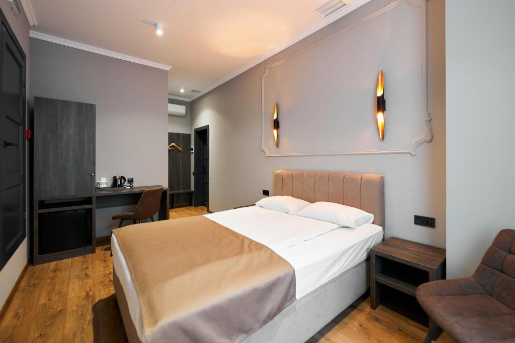 Postel nebo postele na pokoji v ubytování Hotel Classic