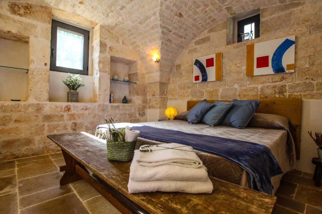 Postel nebo postele na pokoji v ubytování Casina Fumarola