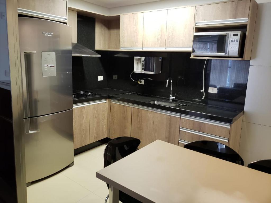  Flat ao lado do shopping