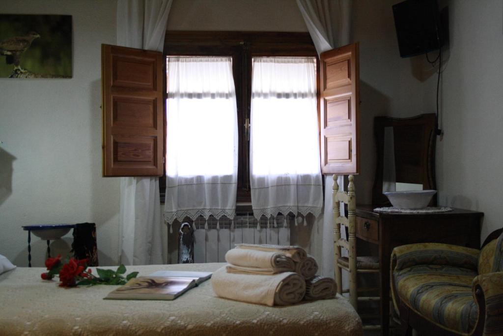 Postel nebo postele na pokoji v ubytování Alojamiento y habitacionesla cañada monfrague
