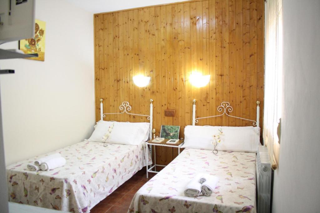 Postel nebo postele na pokoji v ubytování Alojamiento y habitacionesla cañada monfrague