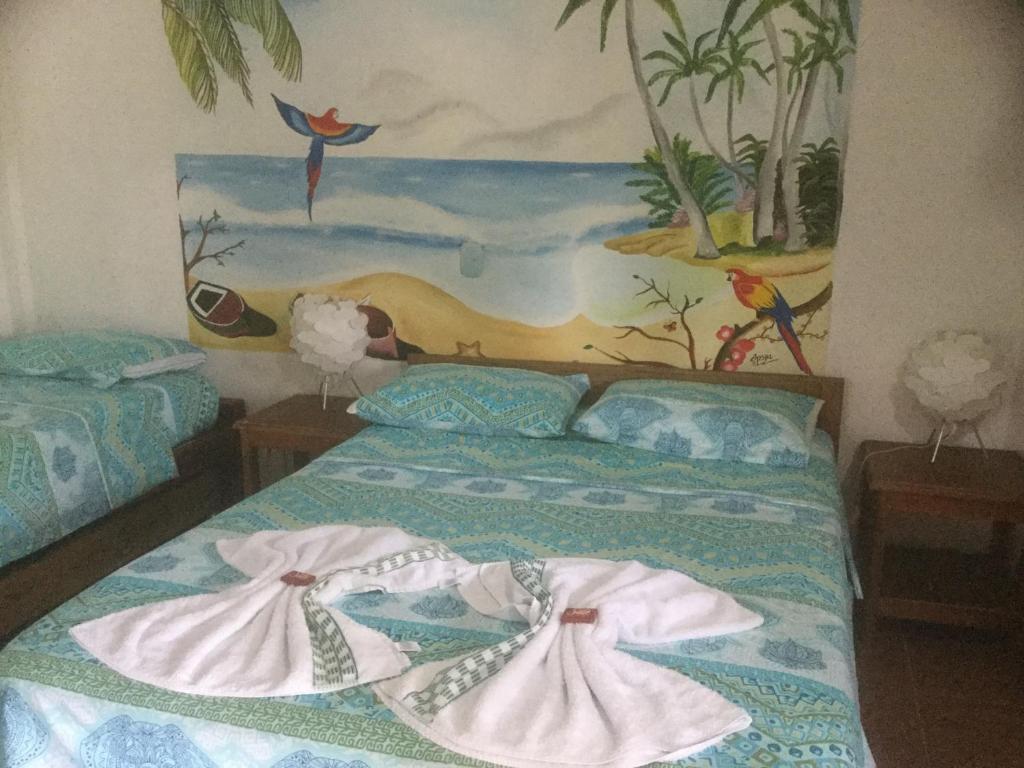 Cama o camas de una habitación en Cabañas Tucan Eco Hotel