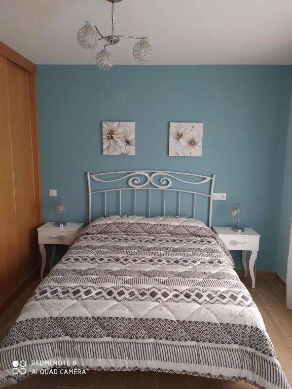 Postel nebo postele na pokoji v ubytování Apartamentos Alameda