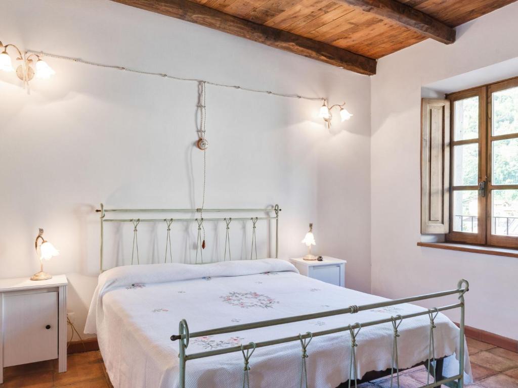 Posteľ alebo postele v izbe v ubytovaní Belvilla by Oyo Castello di Argigliano