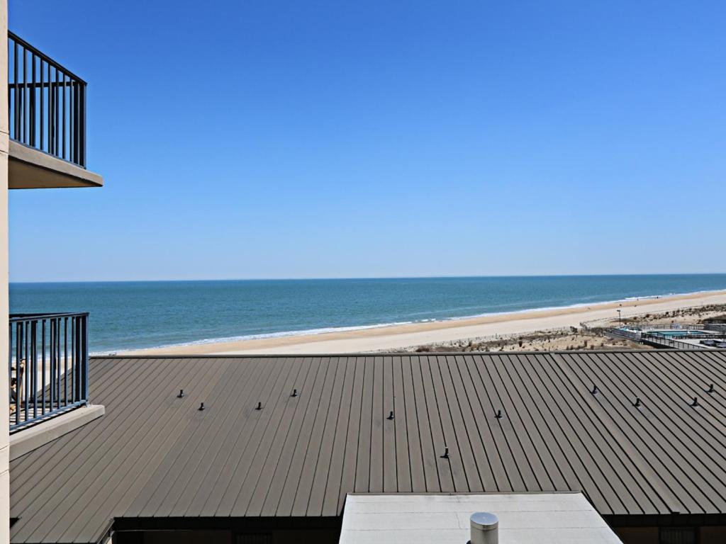 a view of the beach from the balcony of a building at Sea Colony Brandywine House II in Bethany Beach