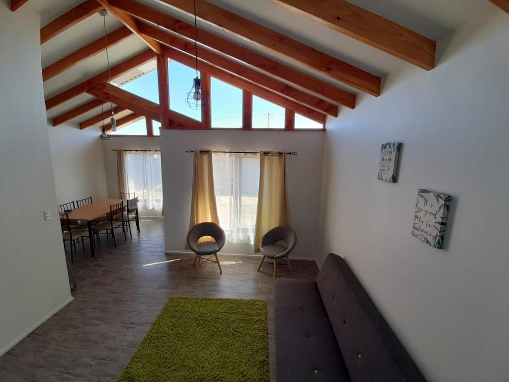 Posezení v ubytování Cabañas Costa las Dichas