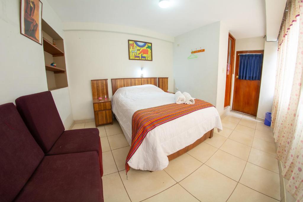 Postel nebo postele na pokoji v ubytování Inka's Rest Hostel