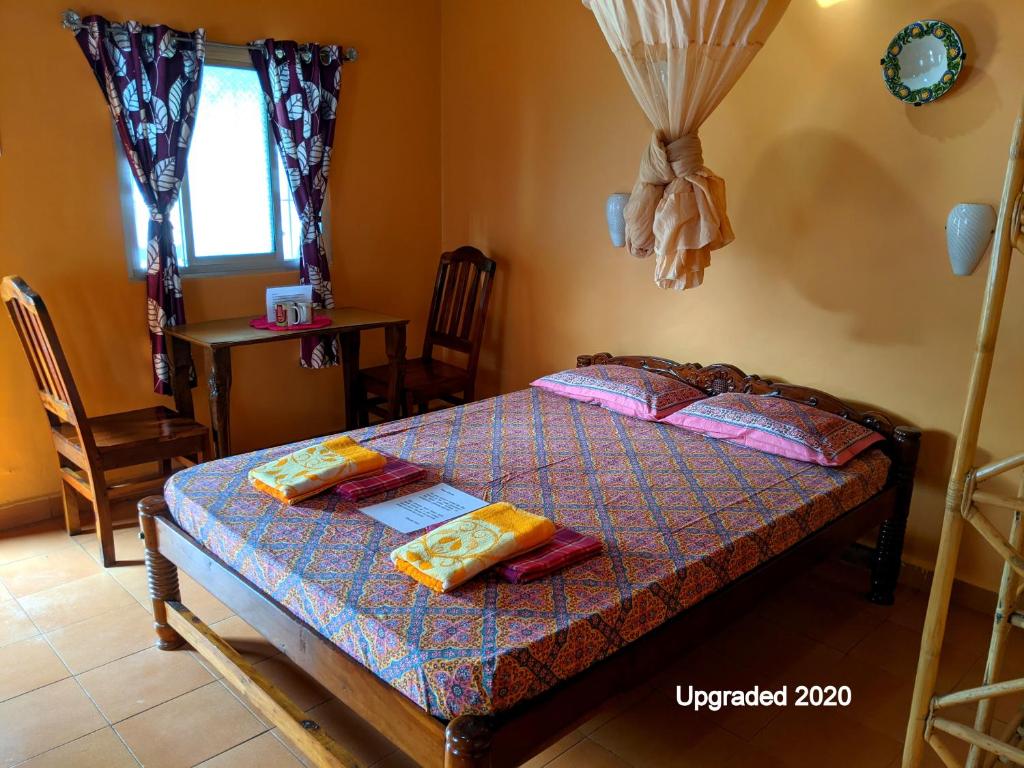 Letto o letti in una camera di Avalon Inn