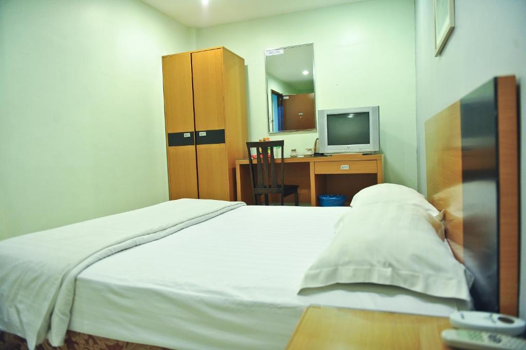 Postel nebo postele na pokoji v ubytování Hotel Centum