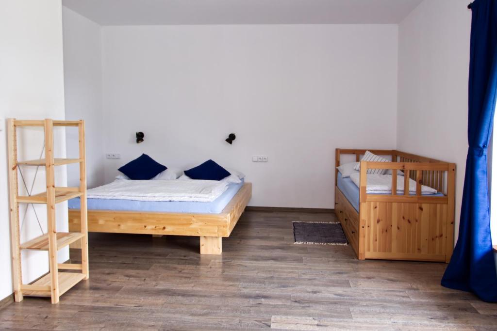 Postel nebo postele na pokoji v ubytování Penzion Albert