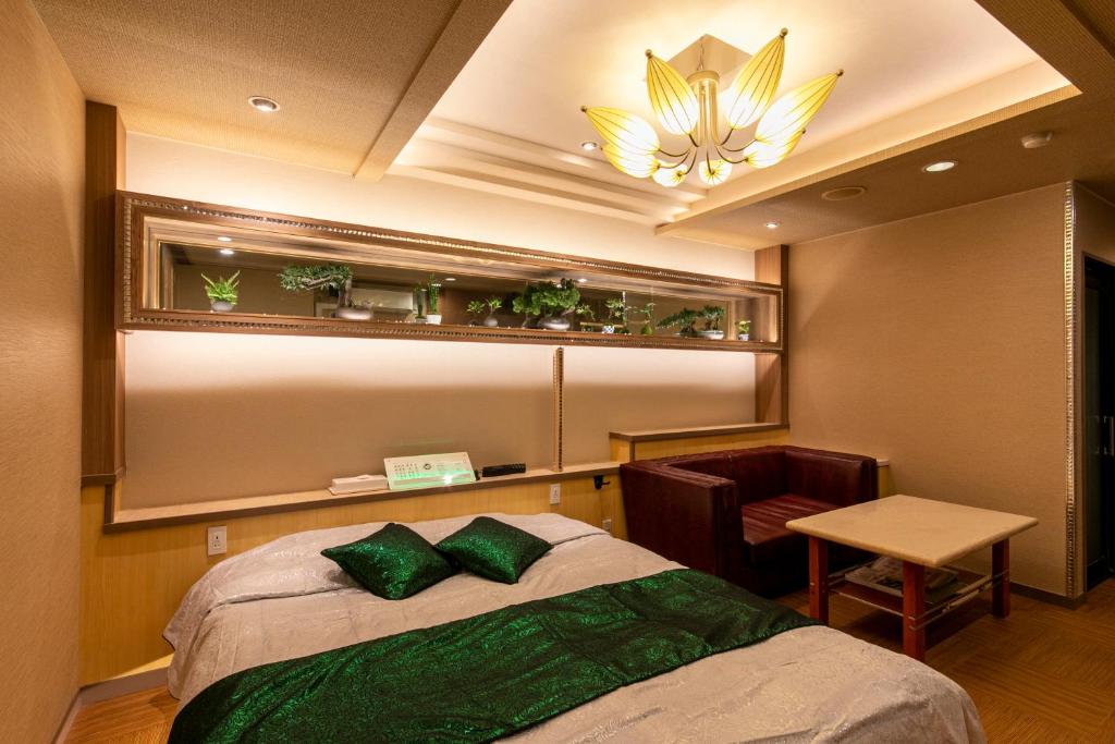 Postel nebo postele na pokoji v ubytování Hotel Park Inn (Adult Only)