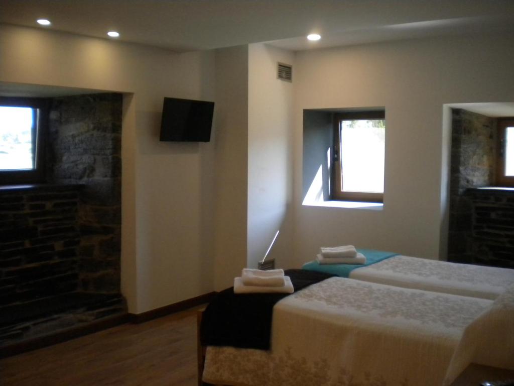 Postel nebo postele na pokoji v ubytování Casa de Aldea Araceli