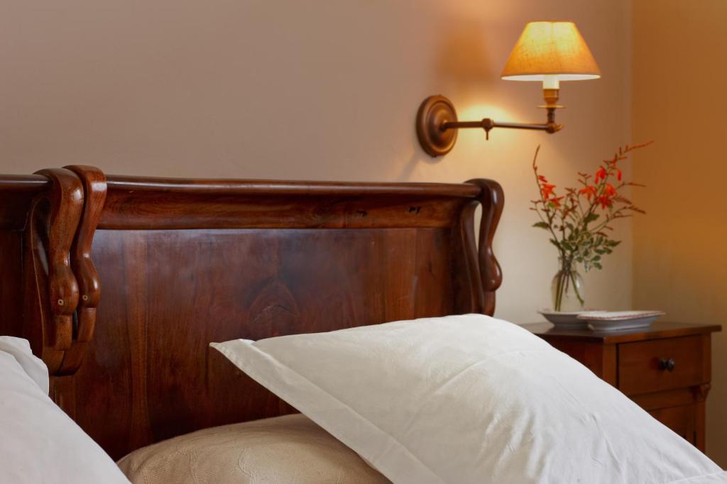 Postel nebo postele na pokoji v ubytování Hotel Ibarra Zalla