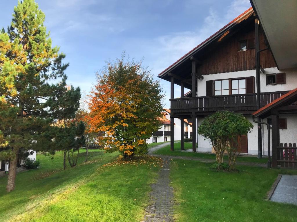 a house with a pathway in front of it at Schöne Ferienapartments im Bayerischer Wald Chrysantihof Zwiesel in Zwiesel