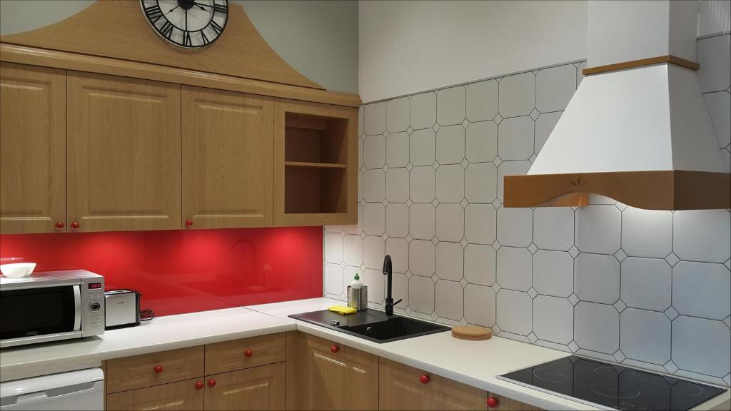 Kuchyň nebo kuchyňský kout v ubytování P&J Apartments Floriańska