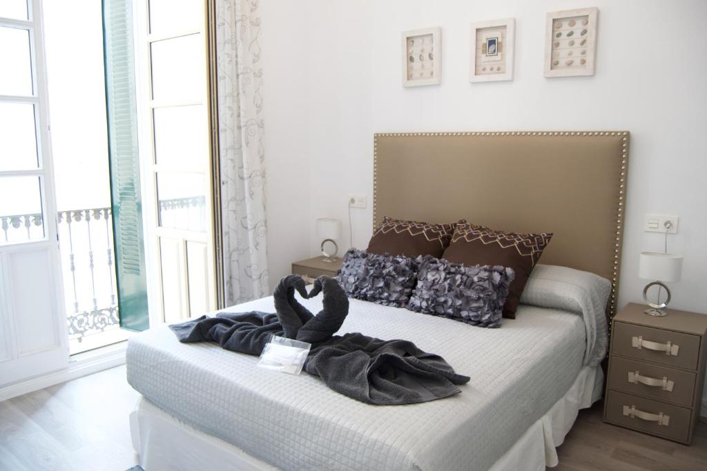 Posteľ alebo postele v izbe v ubytovaní Julieta Historical Apartment by AlohaMalaga