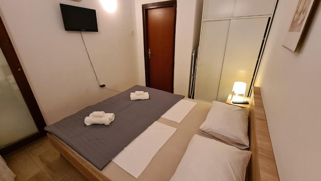 Postel nebo postele na pokoji v ubytování Apartman Hope