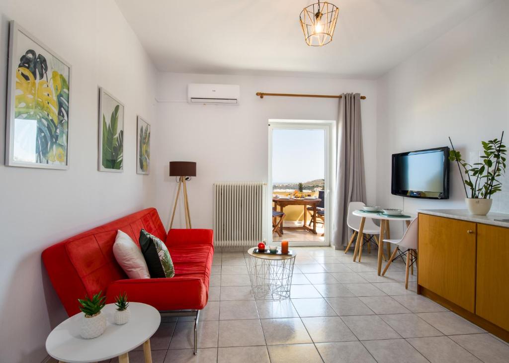 A television and/or entertainment centre at Casa di Halepa