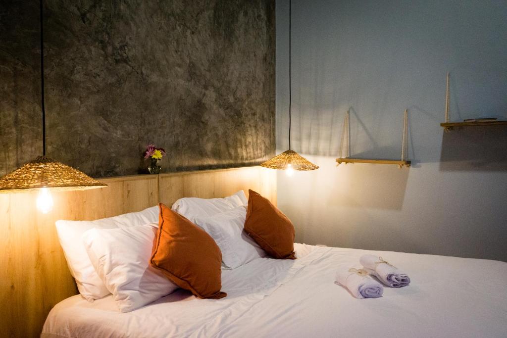 Voodi või voodid majutusasutuse Ecohotel Monte Tierra Habitaciones y Glamping toas