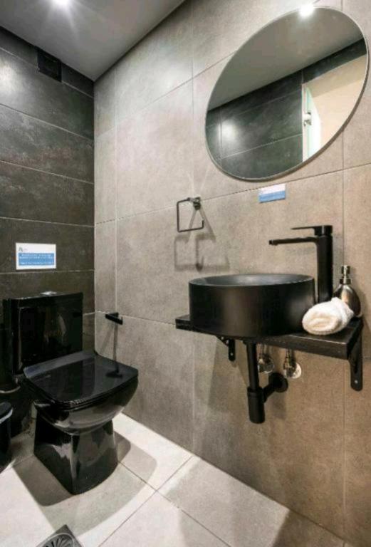 Kúpeľňa v ubytovaní DELUXE ROMANTIC JACUZZI