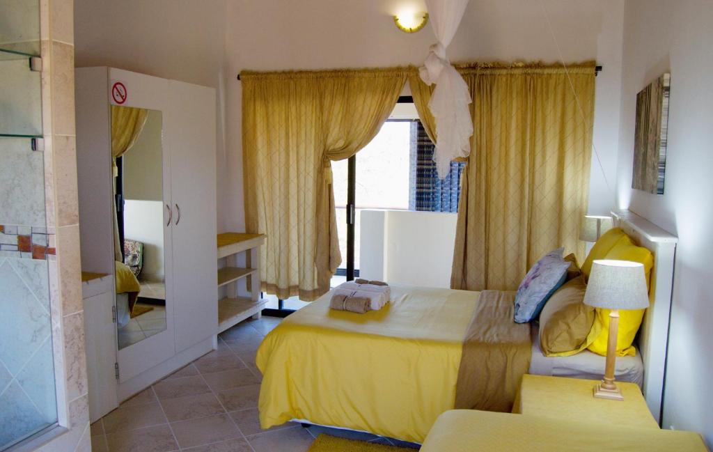Baobab - NUDE - SunEden Family Naturist Resort - Deluxe Double Room (2 Adults + 1 Child)