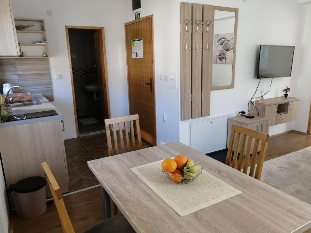 Kuchyň nebo kuchyňský kout v ubytování Apartmani & SPA Matin Breg