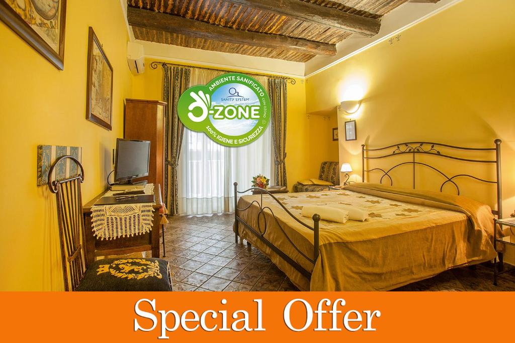 Posteľ alebo postele v izbe v ubytovaní B&B L'Alloggio Dei Vassalli
