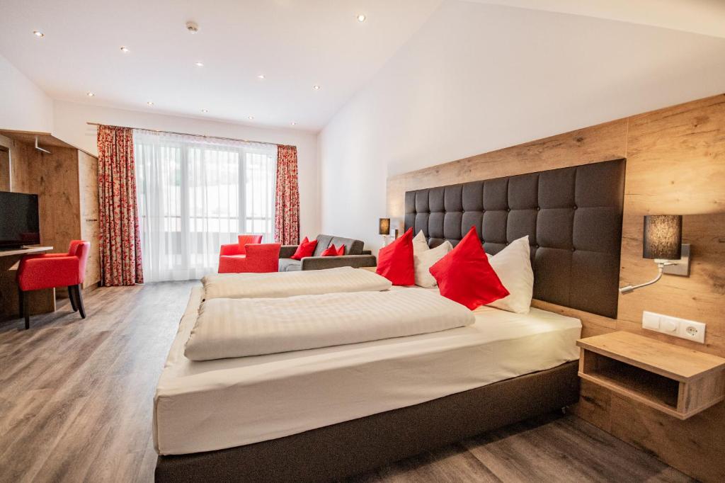 A bed or beds in a room at Hotel Wilder Mann