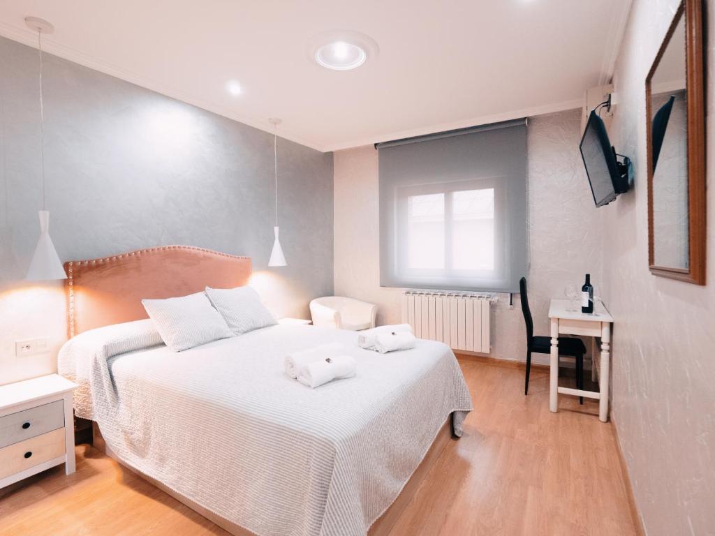 Postel nebo postele na pokoji v ubytování Hotel Los Toreros