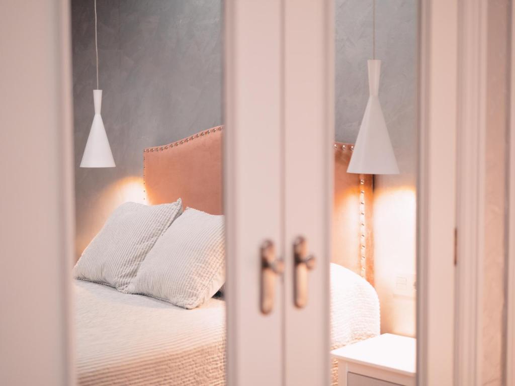 Postel nebo postele na pokoji v ubytování Hotel Los Toreros