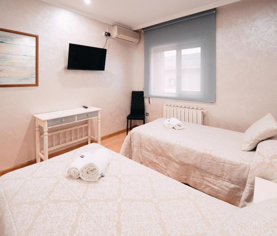 Postel nebo postele na pokoji v ubytování Hotel Los Toreros