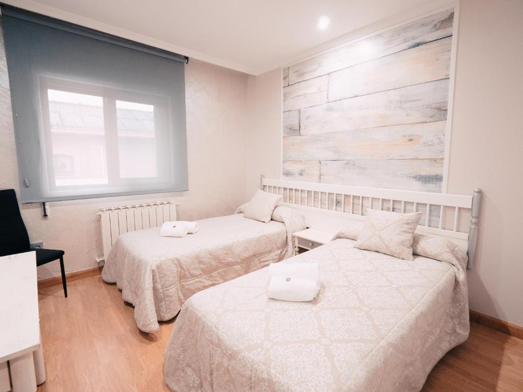 Postel nebo postele na pokoji v ubytování Hotel Los Toreros