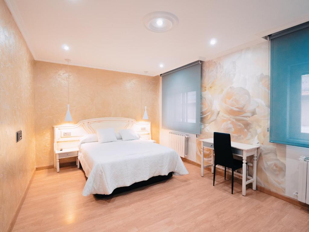Postel nebo postele na pokoji v ubytování Hotel Los Toreros