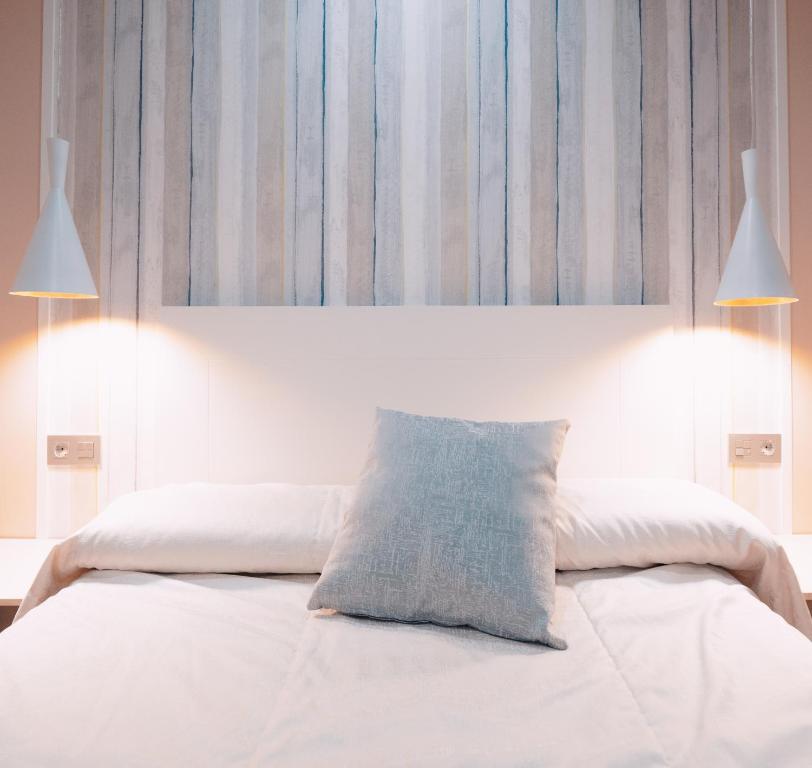 Postel nebo postele na pokoji v ubytování Hotel Los Toreros