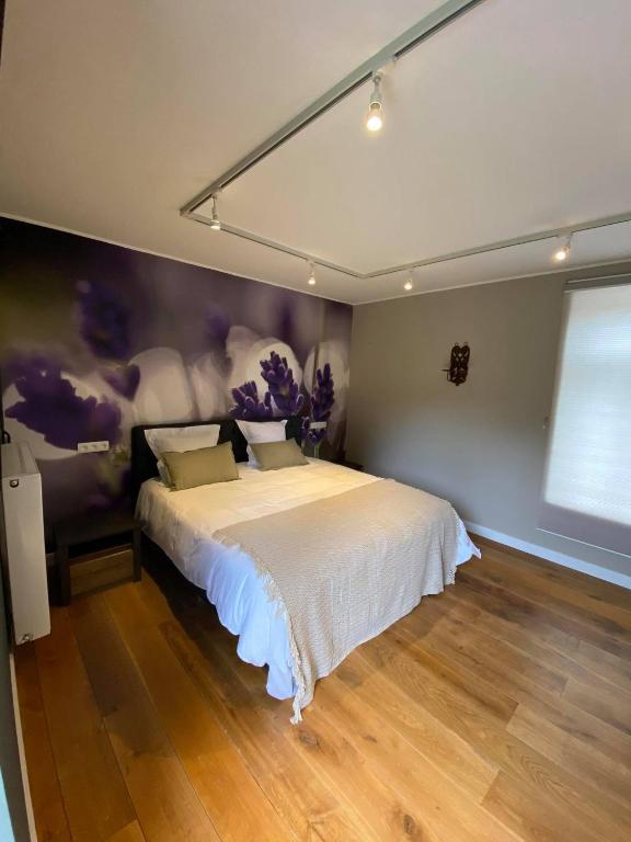 Postel nebo postele na pokoji v ubytování B&B Het Doctershoes