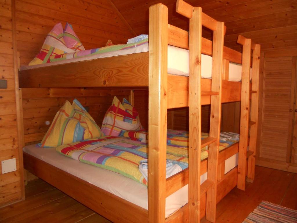 Postel nebo postele na pokoji v ubytování Haus Andrea