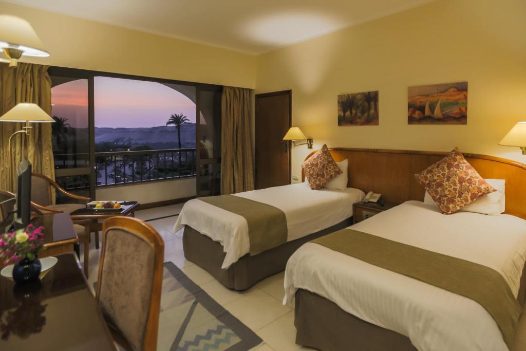 Llit o llits en una habitació de Basma Hotel Aswan