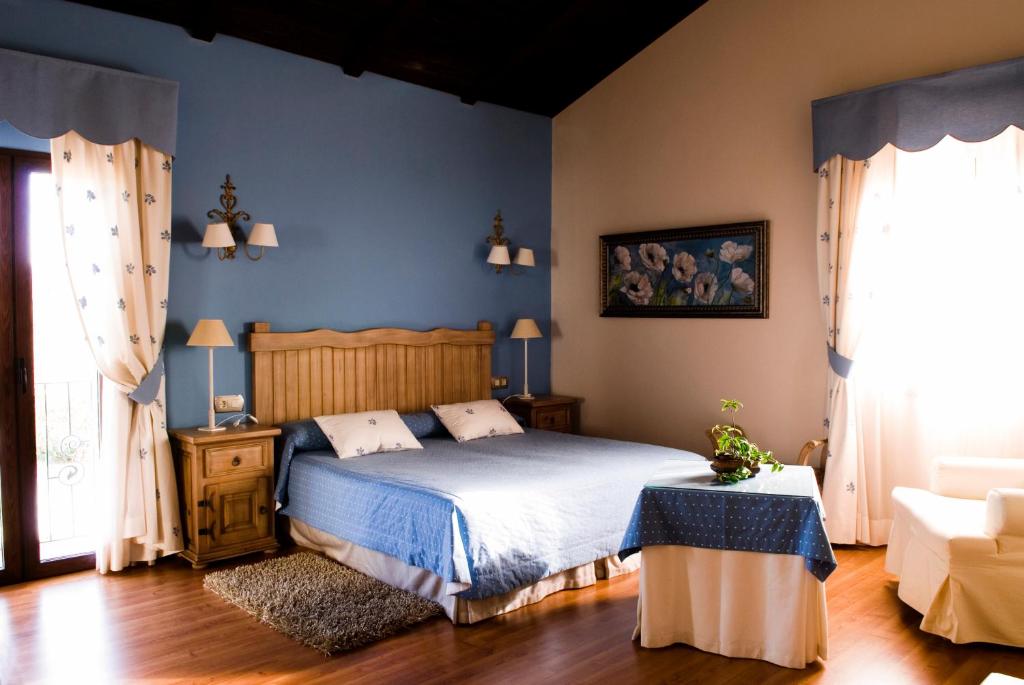 Tempat tidur dalam kamar di Cortijo Salinas
