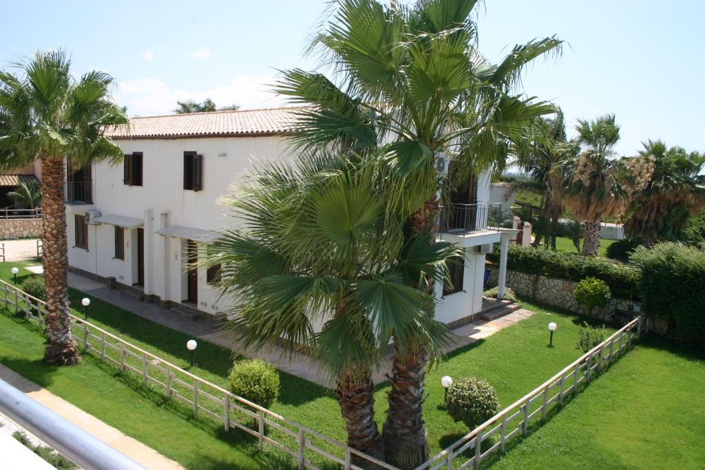 Vonkajšia záhrada v ubytovaní Oasi Guzzetta Hotel&Case Vacanze