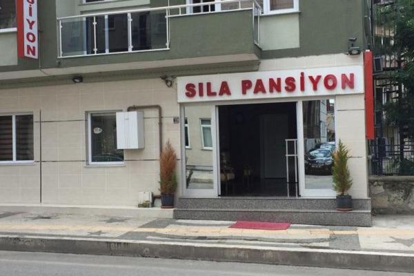 a building with a sign that reads sila pampilion at sıla pansiyon in Edirne