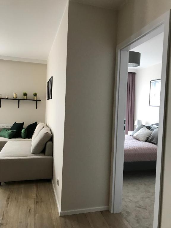 Posteľ alebo postele v izbe v ubytovaní Baltica Sea Apartment II