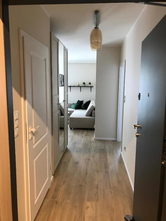 Posteľ alebo postele v izbe v ubytovaní Baltica Sea Apartment II